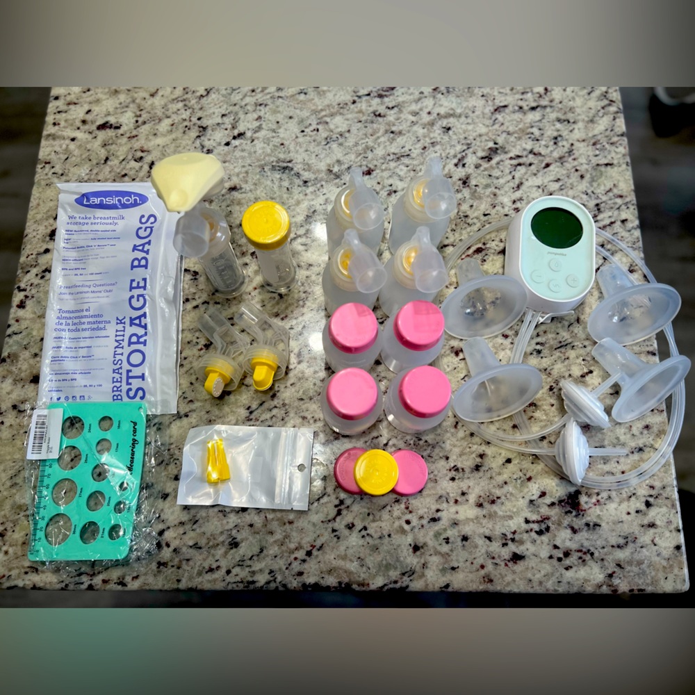 Breast pump lot. Including Pumpables Genie Advanced & Lacteck silicone flanges